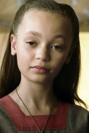 Nico Parker as Milly Farrier