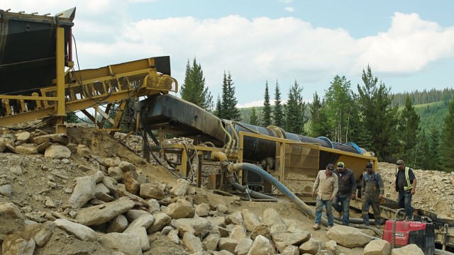 Still from Bust or Gold Boom?